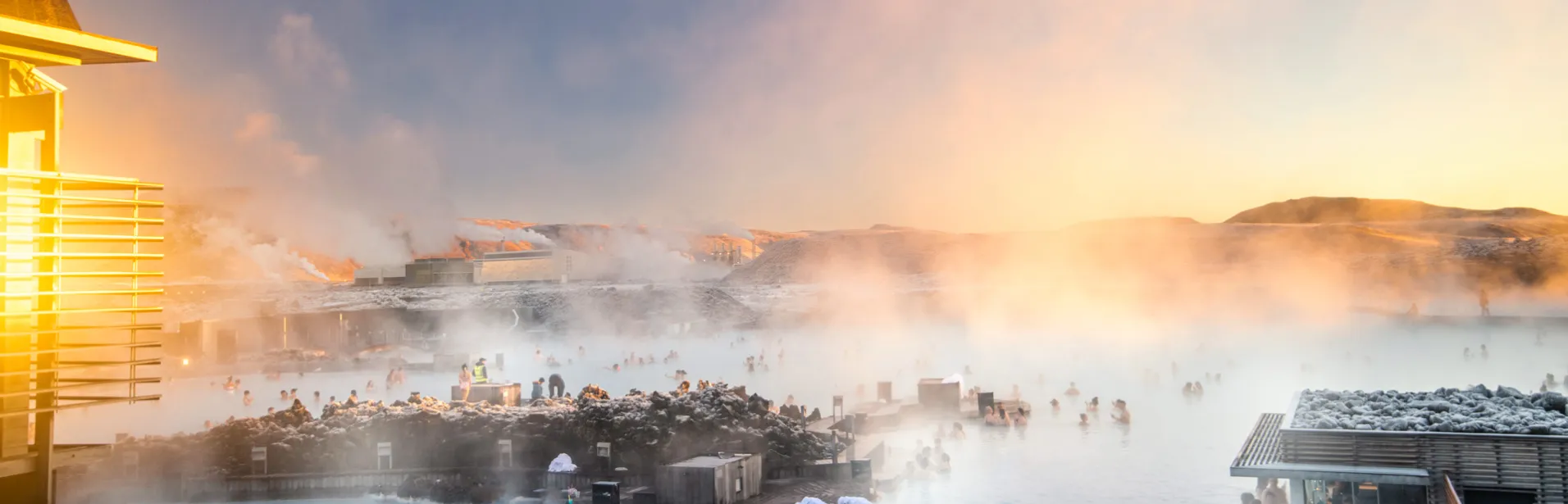 Bathing in the Blue Lagoon in Iceland at sunset.